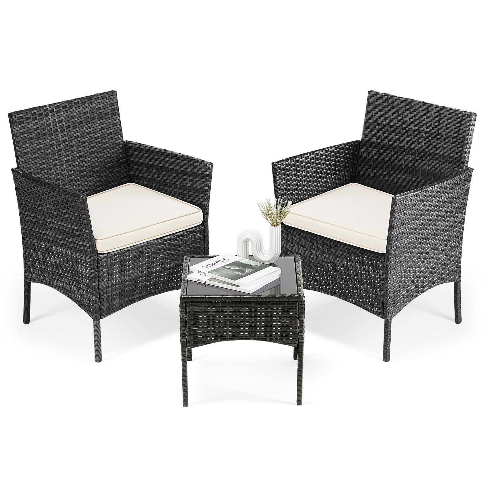Outdoor furniture set with two wicker chairs and a small table on a white background